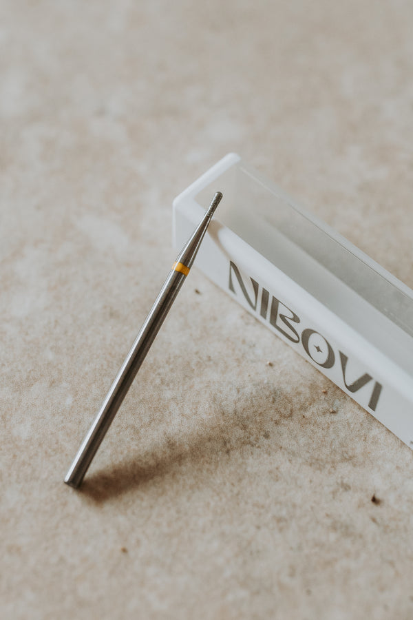 a grey metal drill bit